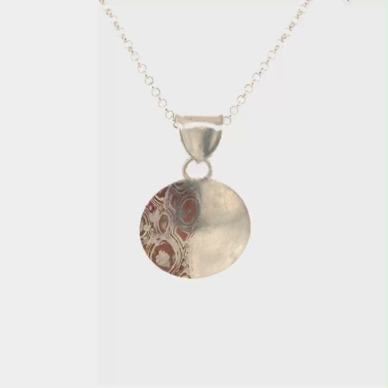 Movie, mokume gane and Argentium silver pendant "Curvy Half and Half".