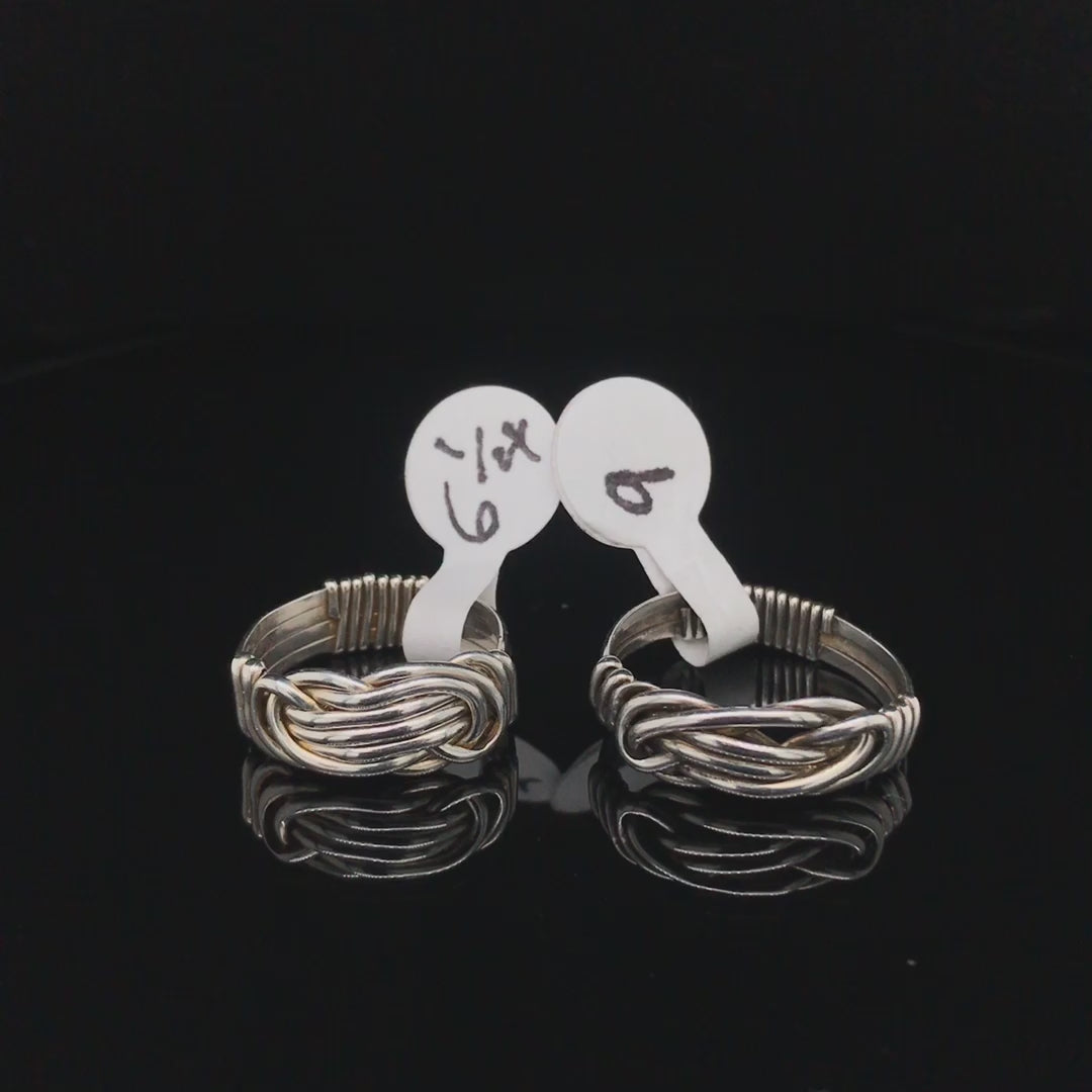 Movie, knotted rings from half-round Argentium silver wire, sizes 6 1/4 and 9.