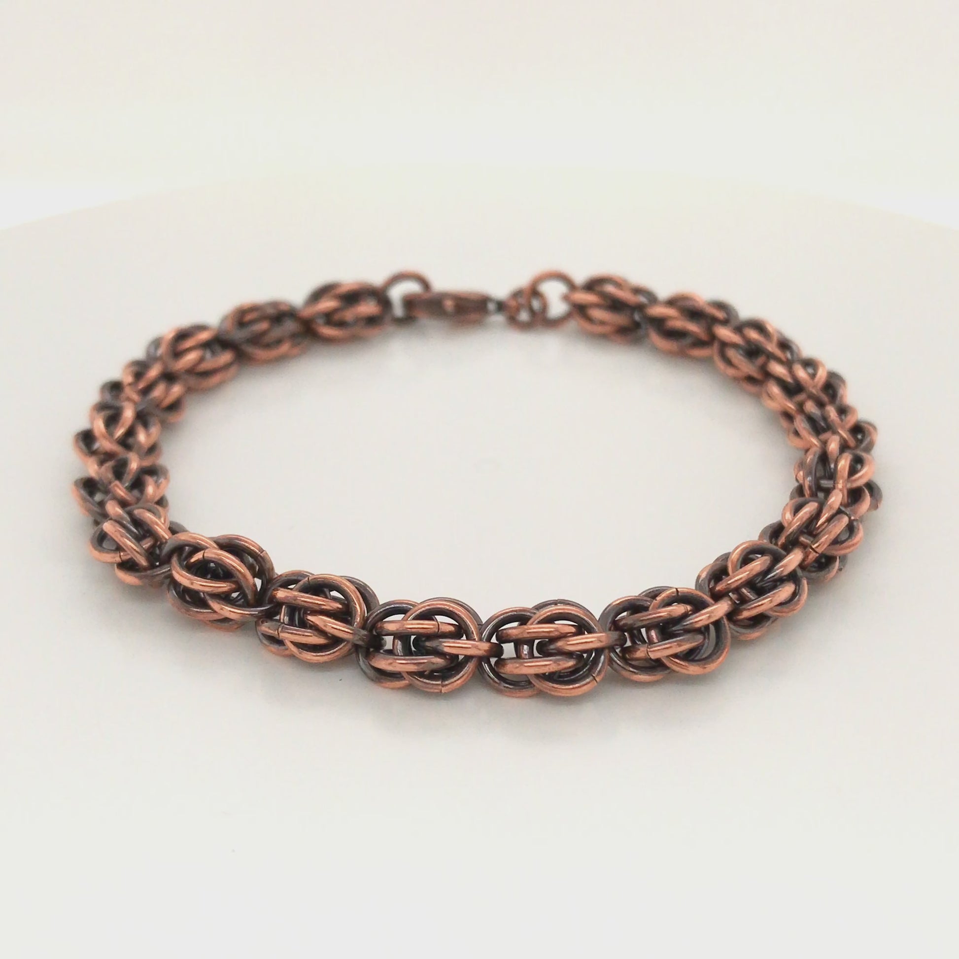 Copper sweetpea chain maille bracelet, patinated, 360-degree movie.