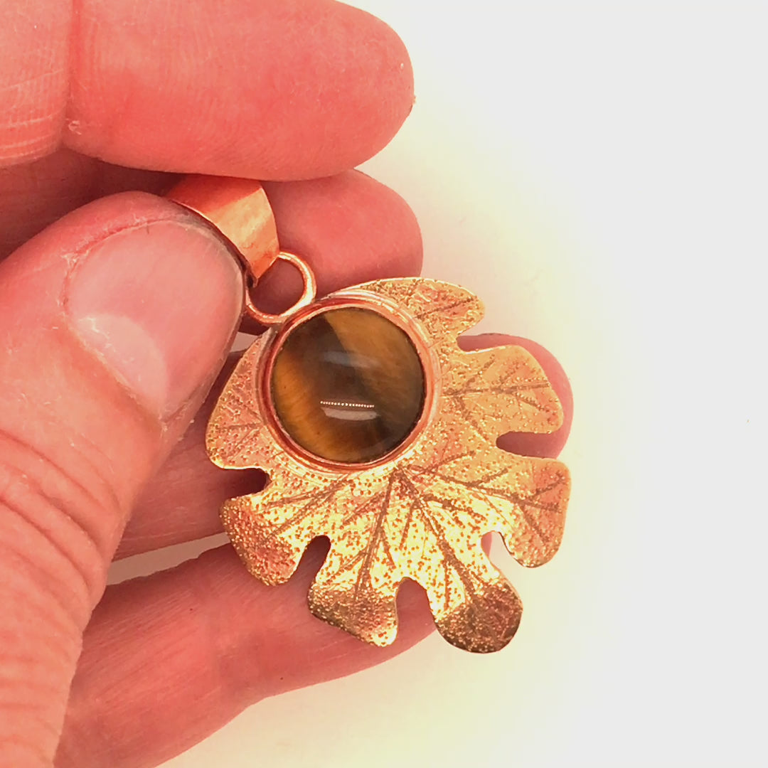 Video, 360 degrees.Tiger's Eye Brass and Copper Oak Leaf Pendant, pointed.