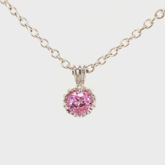 Video, Argentium silver illusion setting pendant with pink CZ.