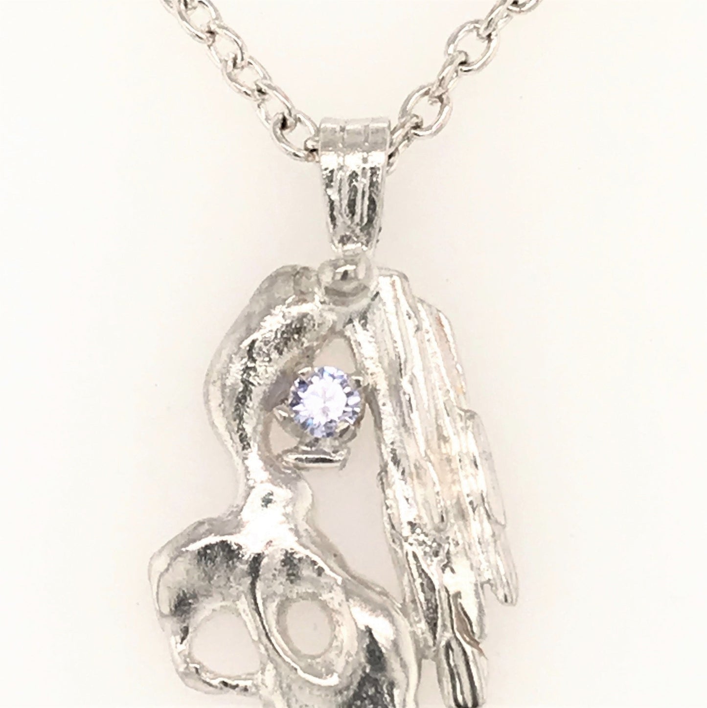 Argentium Silver Pendant with Lavender CZ ("Ship's Figurehead Pendant") - Barb Murrin Jewelry