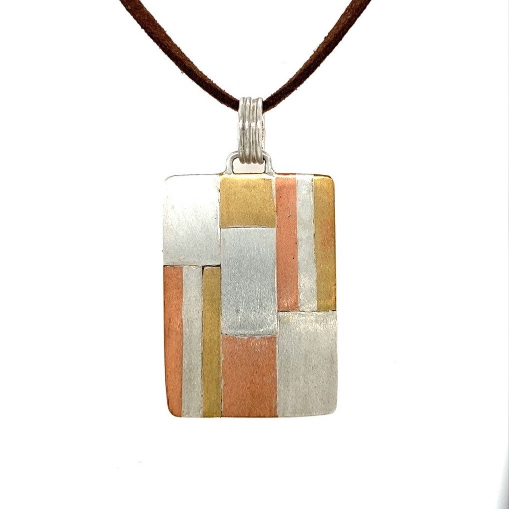 Tri-metal Ribbon Pendant (Argentium Silver, Copper, Brass) - Hanging on leather cord - Barb Murrin Jewelry